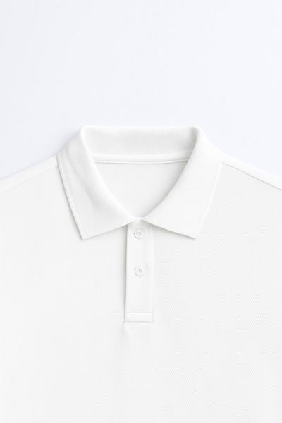 sielta Tricou cu guler polo alb, din bumbac, cu imprimeu lup, scris în turcă Göktürk, slim fit