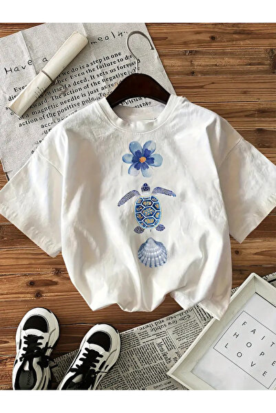 AEMİ تي شيرت برقبة دائرية كبيرة الحجم مطبوع عليه كاريتا باللون الأزرق للجنسين