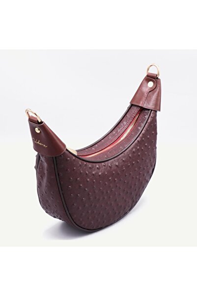 Uderra Leather حقيبة كتف من الجلد الطبيعي مطبوعة باللون الأحمر الداكن من Uder...