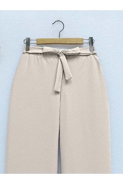 nedo7 Beige wide-leg trousers with elastic waist and tie.