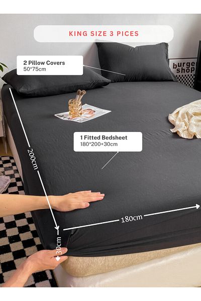 LUNA HOME 3-Piece Set: king-size fitted bedsheet and two pillowcases, washable cotton in a black color.