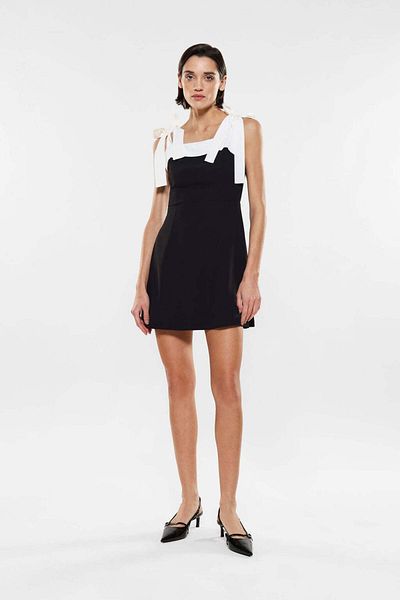 Imperial Elegant black dress with white straps and bows