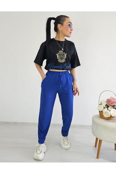 Altı Üstü Butik Тесни крачоли с карирани панталони