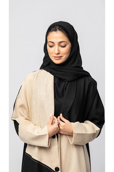 outline Formal cut abaya with front button in black and beige