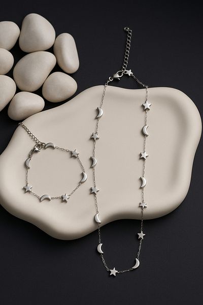 The Collection Non-Tarnish Stainless Steel Crescent Star Figured Women's Steel Necklace Bracelet Set