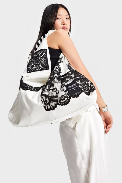 its basic Ecru Black Lace Color Special Design Halter Bag