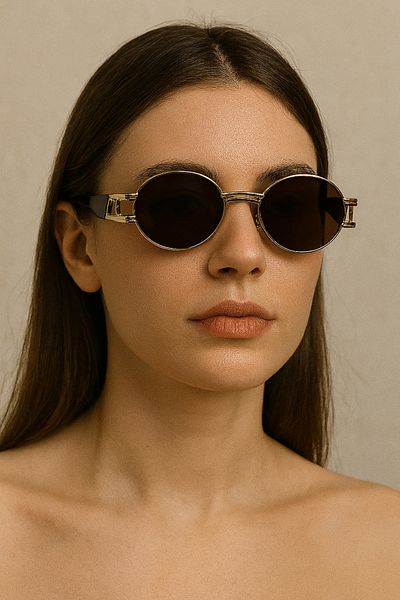style iconic نظارات شمسية دائرية بتصميم عتيق - إطار ذهبي وأذرع سوداء