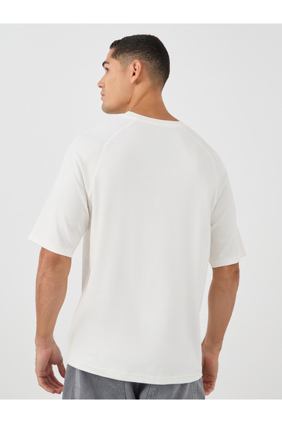 Styli Men Solid Raglan Sleeves Oversized T-Shirt