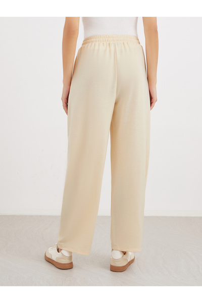 Styli Women Cream Straight Leg Knitted Joggers