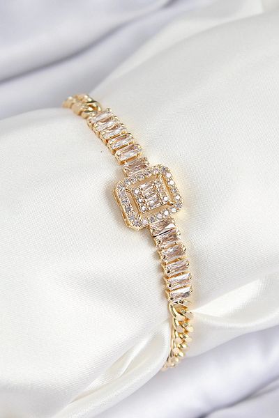 Clariss Brass Zircon Stone Waterway Detailed Baguette Model Gold Color Women's Bracelet