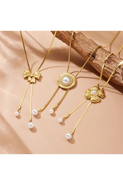 Eva Grace Lucille necklace, gold, stainless steel, with pearls and long bow pendant