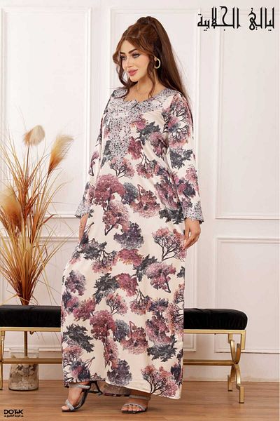 Lyaly aljlabyh Emirati summer mukhawar, silk fabric with an artistic floral pattern and delicate embroidery around the neck, perfect for comfort and everyday elegance.