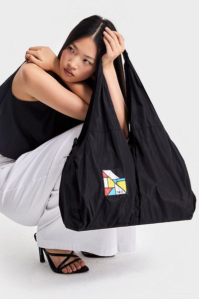 its basic Black Color Special Design Bag with Coat of Arms Detail and Shoulder Strap