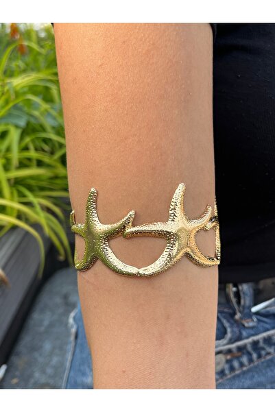 Metal سوار بازو ذهبي اللون مع شكل نجمة