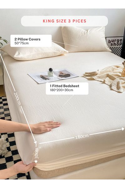 LUNA HOME 3-Piece Set: king-size fitted bedsheet and two pillowcases, washable cotton in a milky white color.