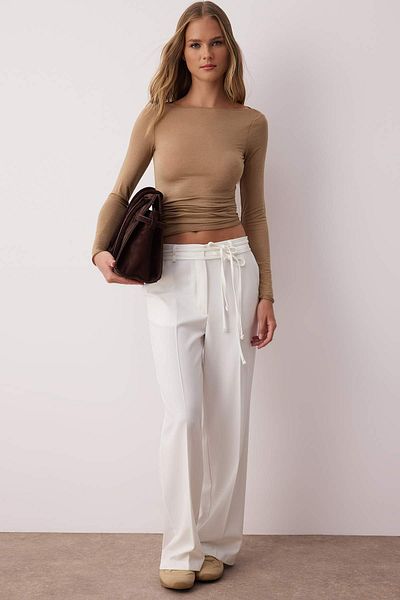 Trendyol Collection Λευκό κορδόνι με λεπτομέρεια χαμηλής μέσης παντελόνι με φαρδύ πόδι/φαρδύ πόδι TWOAW26PL00008