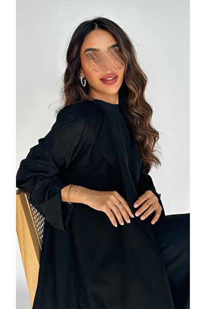 outline Black abaya with a quarter-circle design, made of Limar and Jacquard fabric.