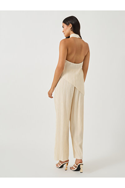 Take Two By Styli Textured Halter Neck Asymmetric Hem Top and Wide Leg Pants Co-Ords