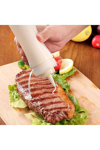 CME Two plastic squeeze bottles for ketchup, mustard, and similar liquids