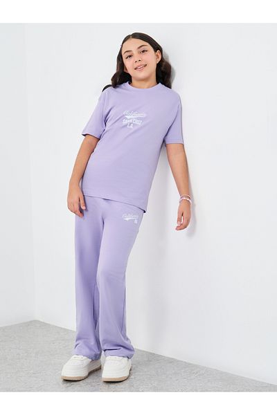 Styli Girls Text Print Oversized T-Shirt and Wide Leg Joggers Set