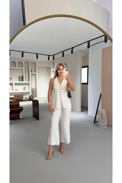 Sezgi Tekin Bone Button Detail Stone Flare Trousers