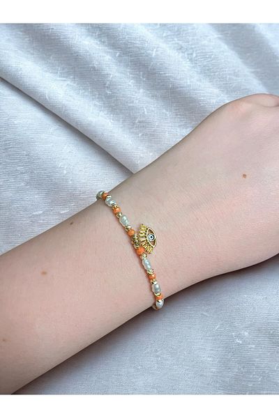Asteria Jewelry Eye Bracelet with Pearl and Bead Detail