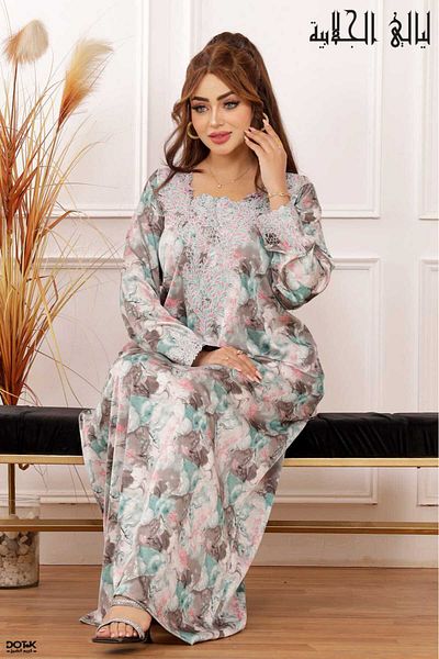 Lyaly aljlabyh Emirati summer mukhawar, silk fabric with an artistic floral pattern and delicate embroidery around the neck, perfect for comfort and everyday elegance.