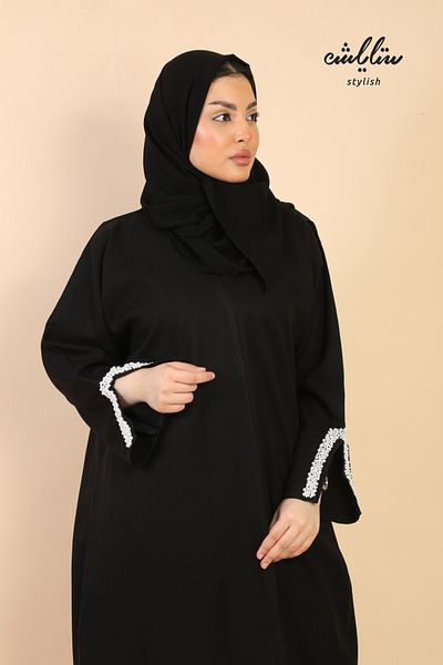 Stylish Black wrap abaya with pearl embellishments on the sleeves