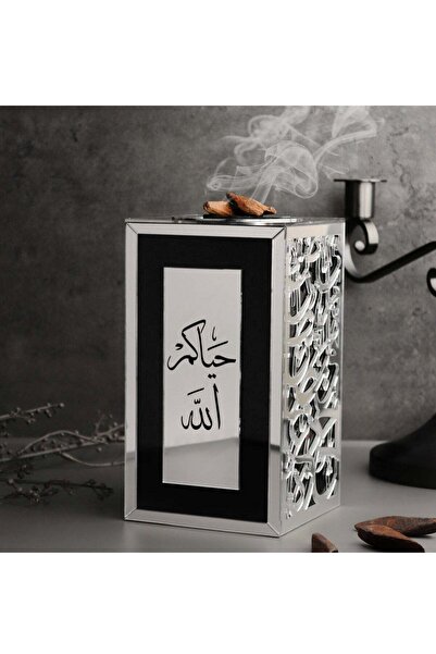 Story of candle مبخرة بخور أنيقه ومميزه تحمل عبارة "حياكم الله" باللون الفضي