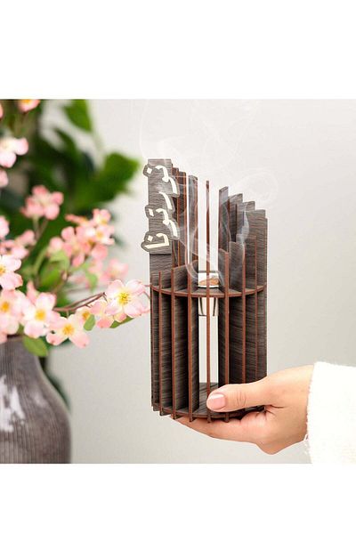 Story of candle Incense Stand For Gifting And Reception With A Unique Touch In Gray Color Featuring 'nurtuna'