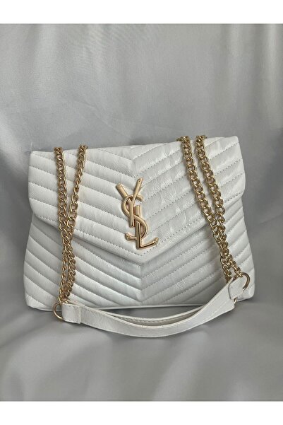 ÇANTA تفاصيل ذهبية أنيقة للمرأة البيضاء