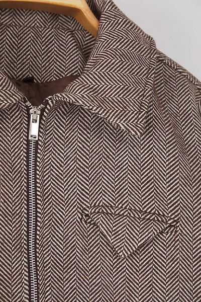 Trendyol Collection Кафяво тънко яке тип „рибена кост“ с шарка, голям размер, бомбър TWOAW26AW00018