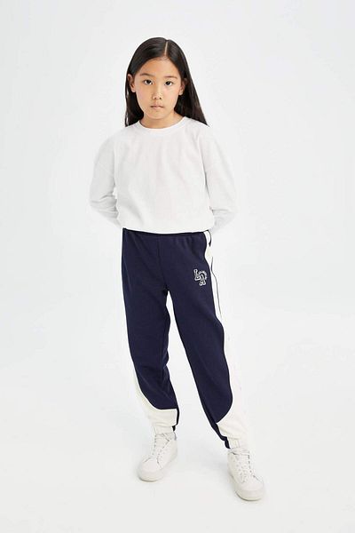 DeFacto Marineblaue Jogger-Jogginghose für Mädchen mit bedrucktem Bund und elastischem Bein 3153805