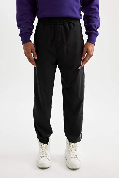 DeFacto DeFactoFit NBA Los Angeles Lakers Dokuma Jogger Eşofman Altı Slim Fit Dar Kesim Cepli Ekstra Dar Paç