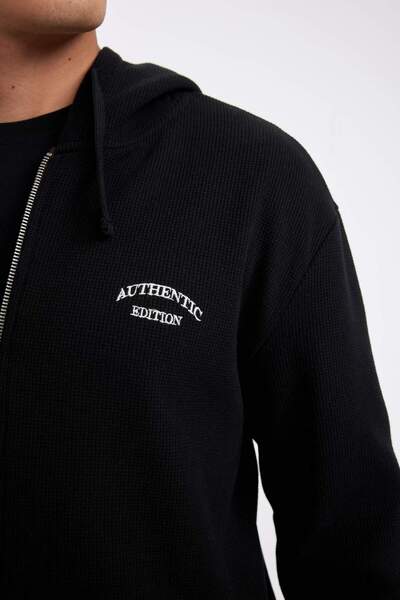DeFacto Siyah Relax Fit Kapüşonlu Waffle Baskılı Cepli Fermuarlı Sweatshirt D2629AX24AU