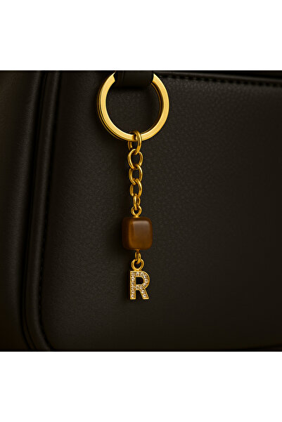 Han Ticarethane سلسلة مفاتيح عين النمر على شكل حرف R من الحجر الذهبي اللون