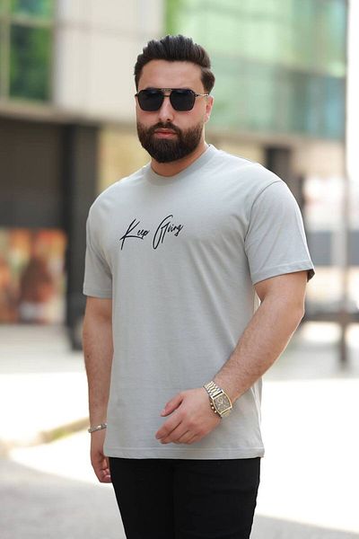 STOCX Keep Going Oversized Men's T-Shirt with Text and Graphic Detail