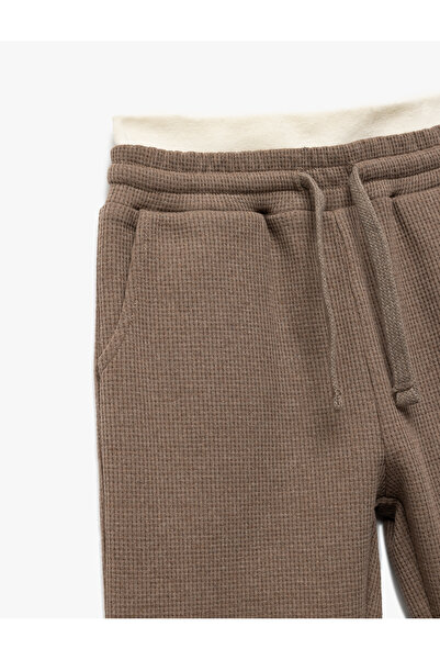 Koton Βασικό σχολικό παντελόνι με ριμπάκια, δεμένη μέση και τσέπες