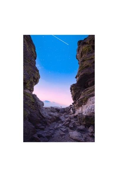 OEM Tablou Canvas, 'Stea cazatoare intre stanci masive'