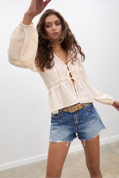 Stradivarius Loose-fitting embroidered knot blouse