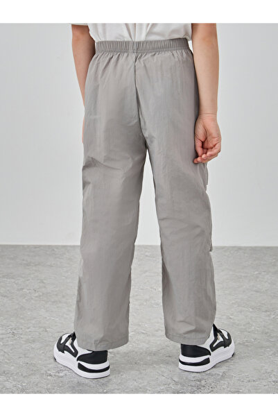 Styli Solid Elastic Waist Pocket Detail Pants