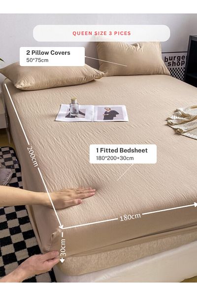 LUNA HOME 3-Piece Set: queen-size fitted bedsheet and two pillowcases, washable cotton in a beige color.