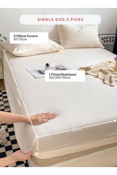 LUNA HOME 3-Piece Set:single-size fitted bedsheet and two pillowcases, washable cotton in a milky white color.