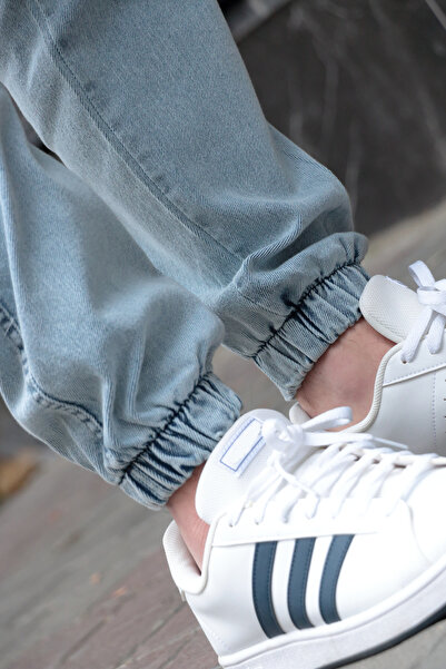 Osyday Чоловічі джинси-джоггери з кишенями, синього кольору, з еластичним поясом і манжетами, з еластичної тканини