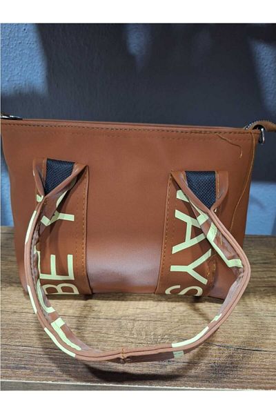 glowfit Geantă de mână și crossbody model Leo din țesătură din satin Buzzy, bronzat