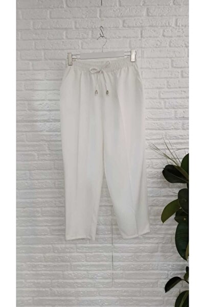 Butik Eylül ، مقاس كبير، سروال مرن من قماش الجزر مع جيوب