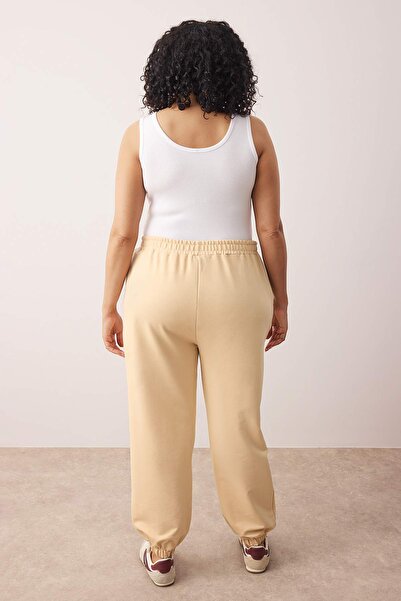 Trendyol Curve Mink Loose Jogger Slim Leg Elastic Waist Stretchy Waist Knitted Plus Size Sweatpants Tbbaw23Aj00002