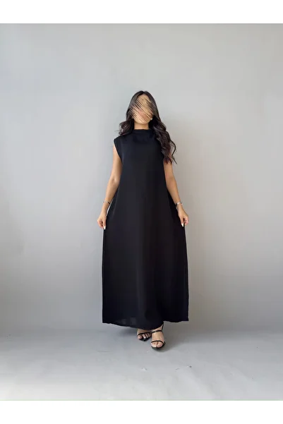 outline Black quarter-cloche abaya package with black rose embroidery and a dress underneath the abaya