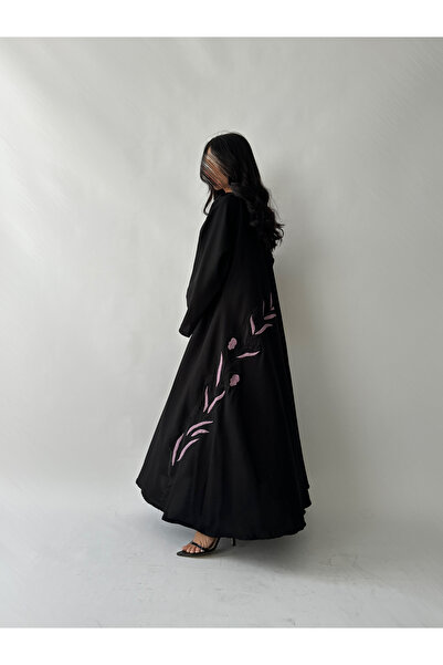 outline Black abaya package made of Lemar fabric with floral embroidery and a dress underneath the abaya