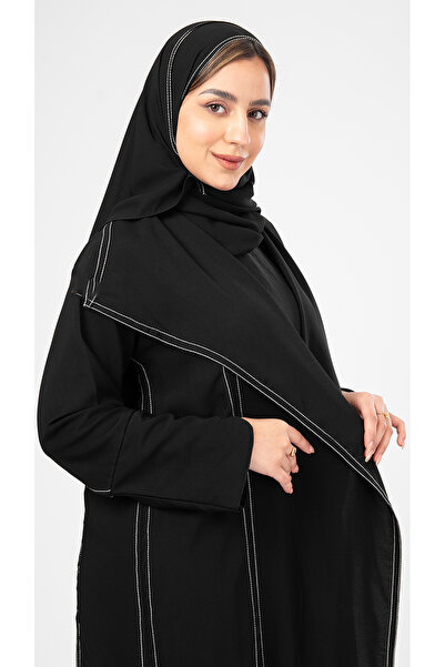 outline Black abaya with white embroidery, elegant and modern design